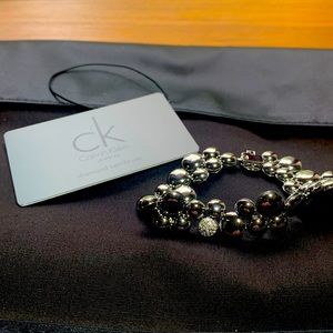 Ladies 7, Calvin Klein Bracelet, silver with pave diamond, certified